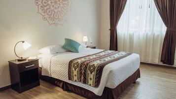 Superior Triple Room | Minibar, individually decorated, iron/ironing board, bed sheets