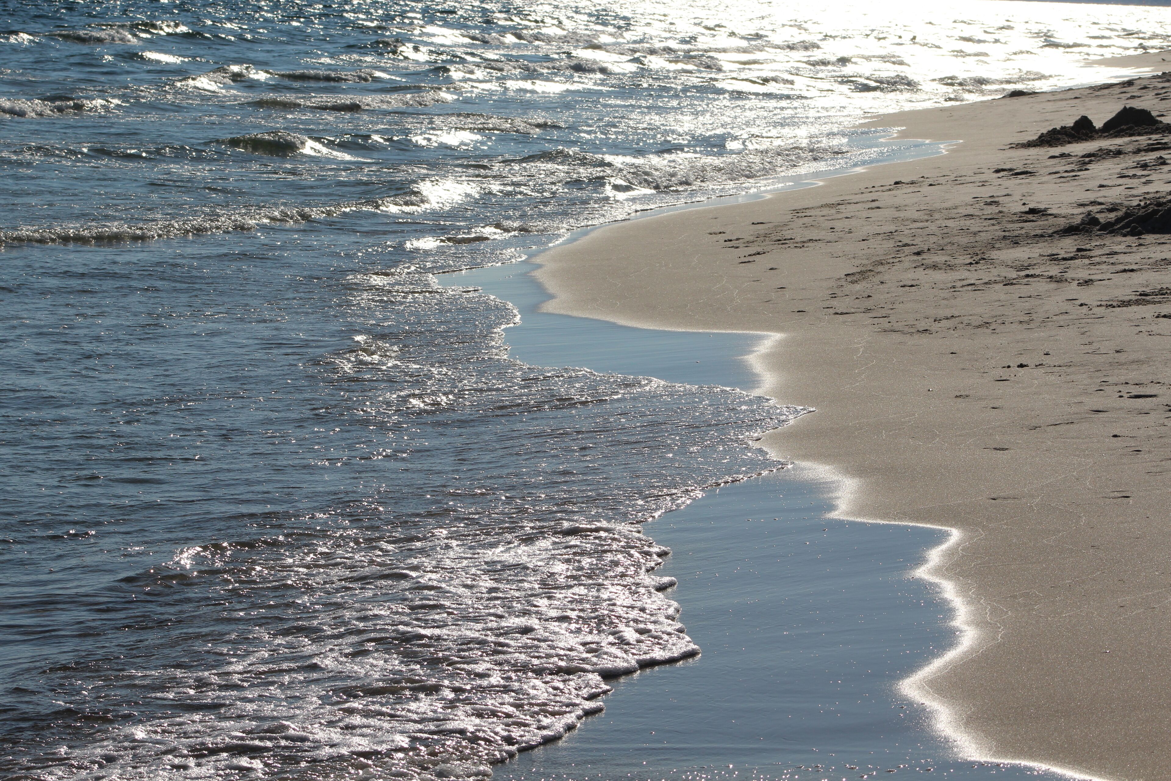 On the beach, sun loungers