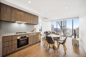 Two Bedroom Two Bathroom Apartment | Private kitchen | Full-size fridge, microwave, oven, stovetop