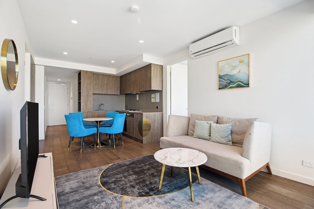 Two Bedroom Two Bathroom Apartment | Living area | 55-inch flat-screen TV with digital channels, TV