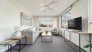Standard Apartment | Living room | Flat-screen TV