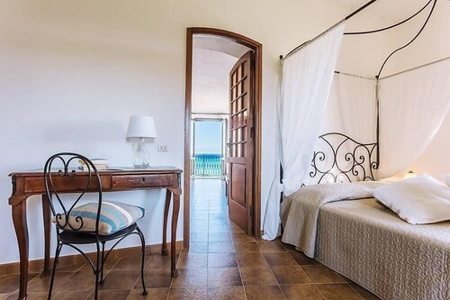 Casa Iorana F: A welcoming two-story ancient watch tower located right on the beach, with Free WI-FI.
