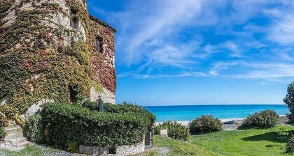 Casa Iorana F: A welcoming two-story ancient watch tower located right on the beach, with Free WI-FI.