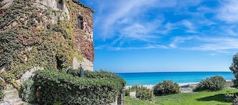 Casa Iorana F: A welcoming two-story ancient watch tower located right on the beach, with Free WI-FI.
