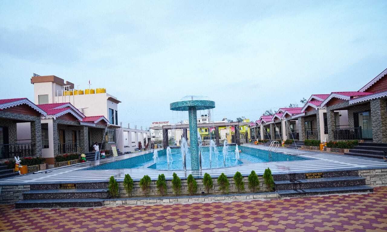 Indoor pool, outdoor pool, free pool cabanas, pool umbrellas