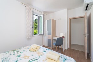 1 chambre, fer et planche à repasser, Wi-Fi gratuit, draps fournis