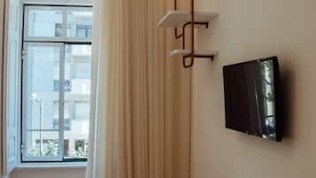 Premium King Room | Living area | 32-inch LCD TV with satellite channels, TV