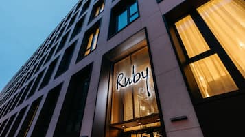 A building with a prominent 'Ruby' sign, large windows, and a modern architectural design.