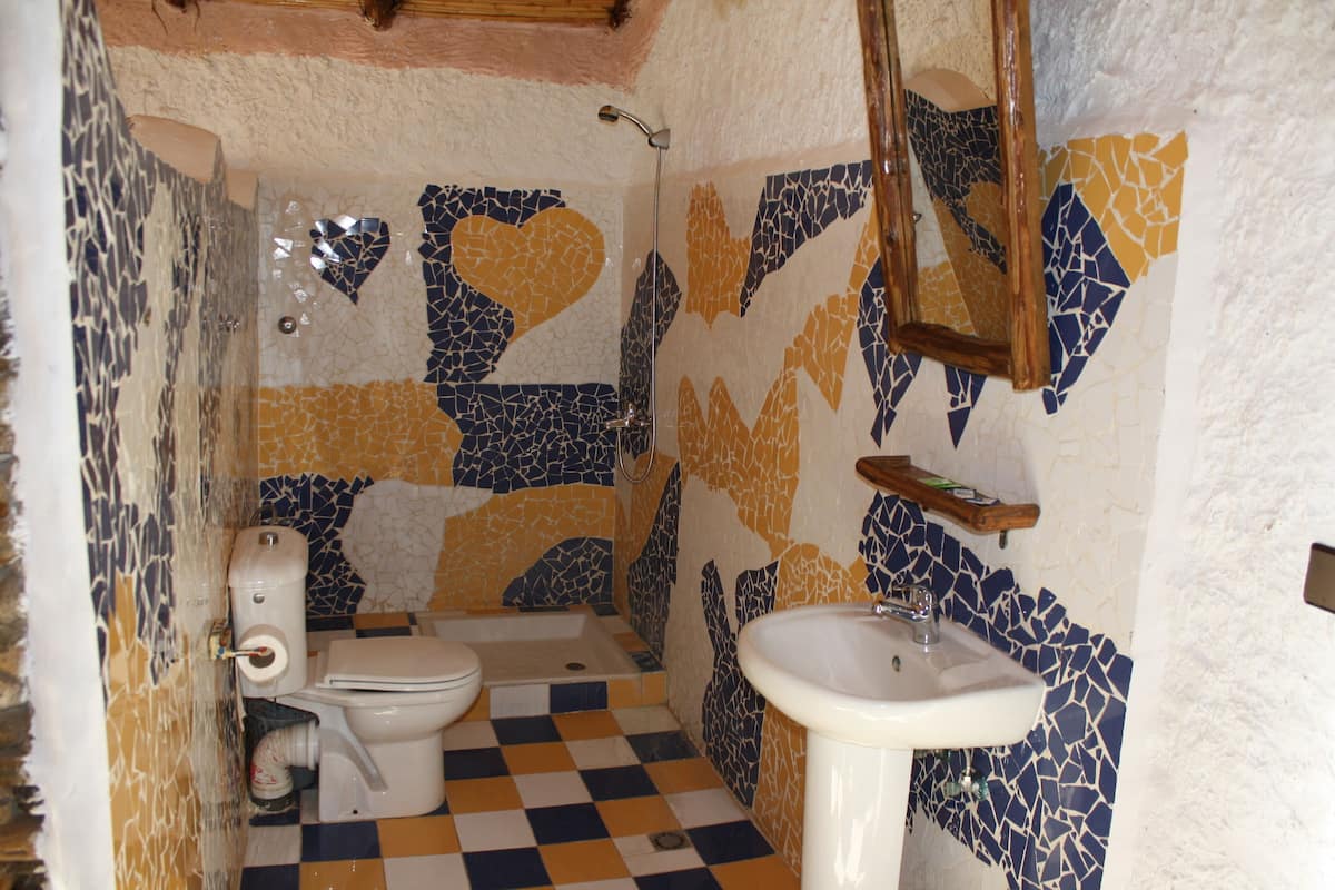 grand triple room | bathroom | shower, free toiletries, towels, soap