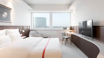 Rom (Loft) | Sengetøy av topp kvalitet, safe på rommet og individuelt dekorert