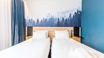 Habitación clásica, 2 camas individuales | Ropa de cama de alta calidad y minibar