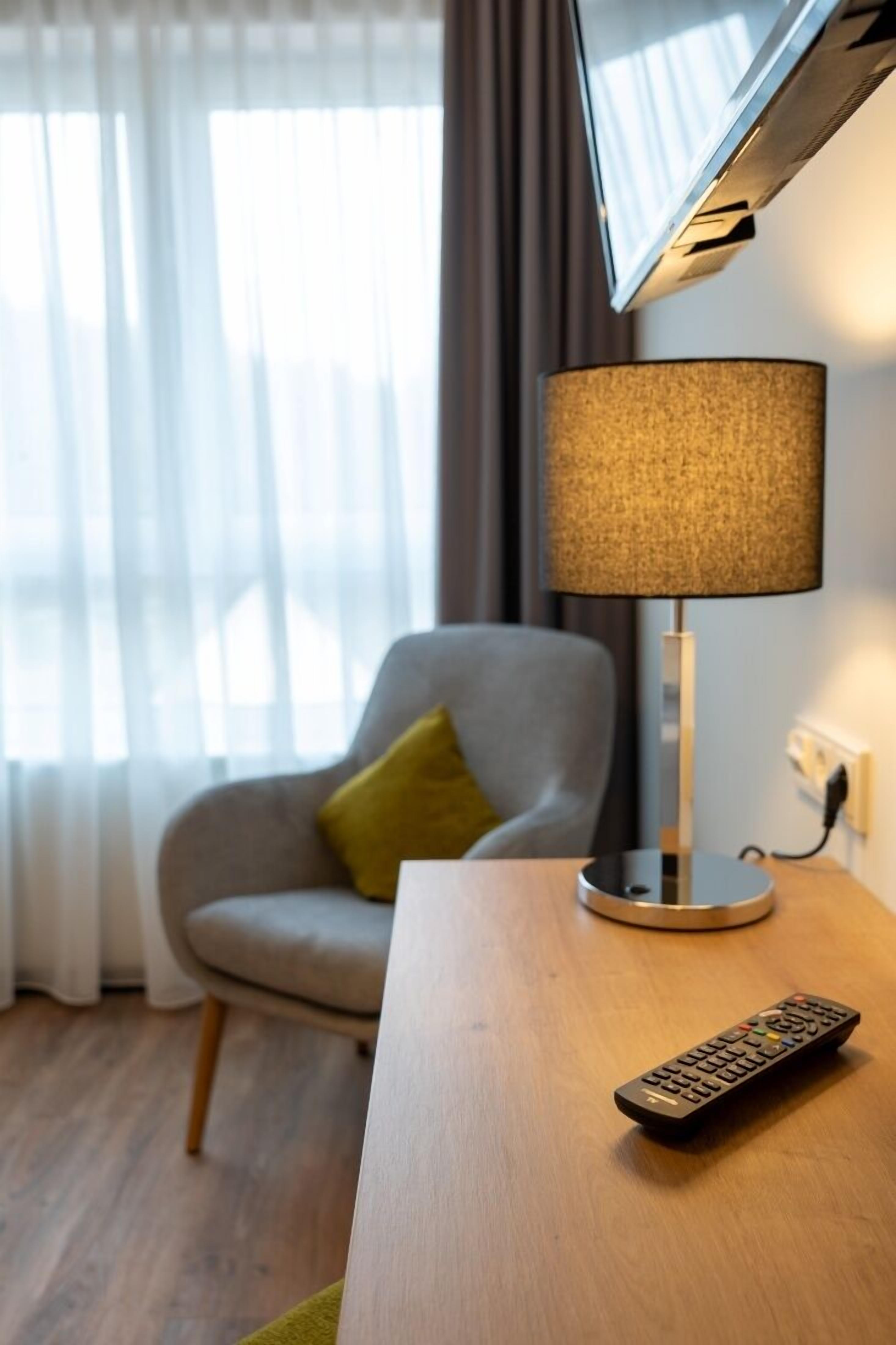 comfort double room | living area | 80-cm led tv with cable channels, tv