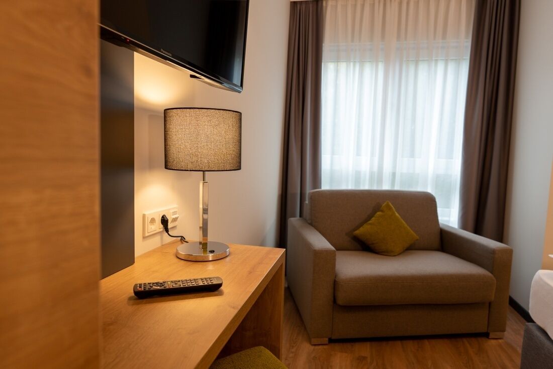 comfort double room | living area | 80-cm led tv with cable channels, tv
