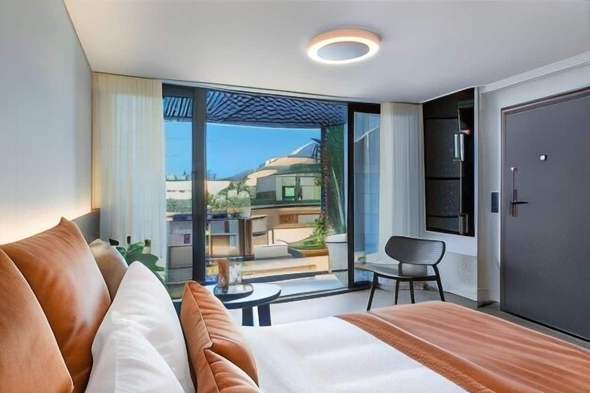 Minibar, blackout curtains, soundproofing, iron/ironing board