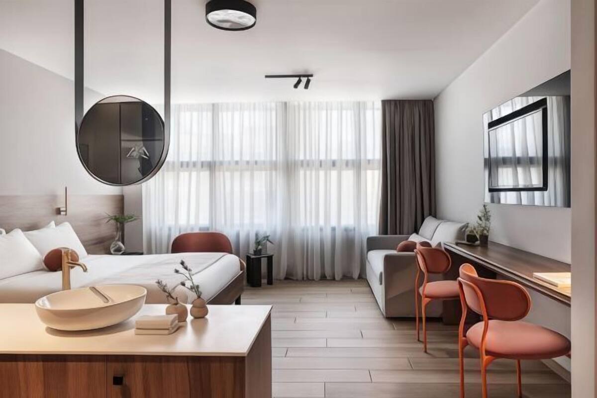 Minibar, blackout curtains, soundproofing, iron/ironing board