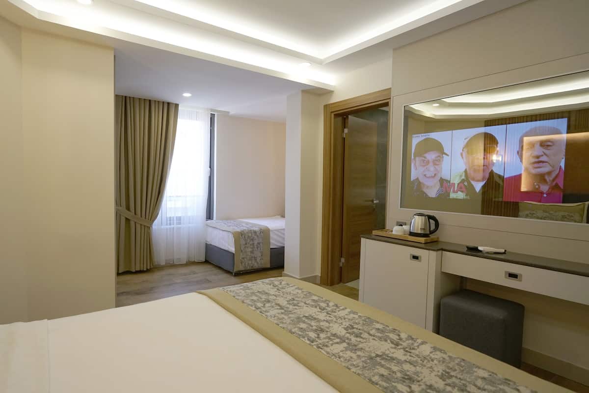Triple Suite | Premium bedding, minibar, in-room safe, individually decorated