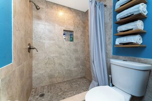 Shower, hair dryer, towels, soap