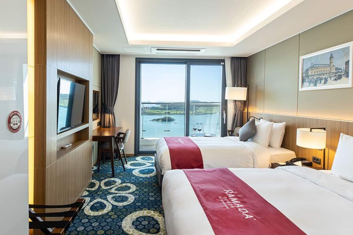 Quarto duplo premier, vista para o oceano | Edredons de pluma, cofres nos quartos, escrivaninha, cortinas blackout