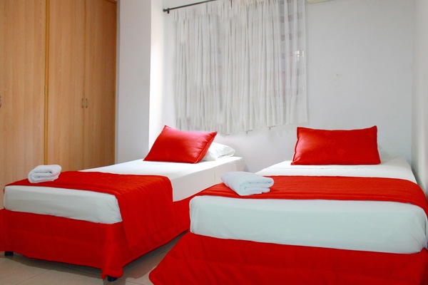 Wifi gratis, muebles diferentes y ropa de cama
