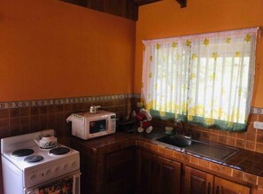 Microwave, coffee/tea maker, cookware/dishes/utensils