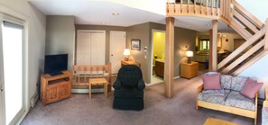 Télévision, cheminée, livres