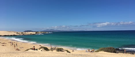 Una spiaggia nelle vicinanze, teli da spiaggia