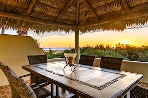 Outdoor dining - Beach House overlooking San Pedrito surf break with brand new pool. (Pescadero)