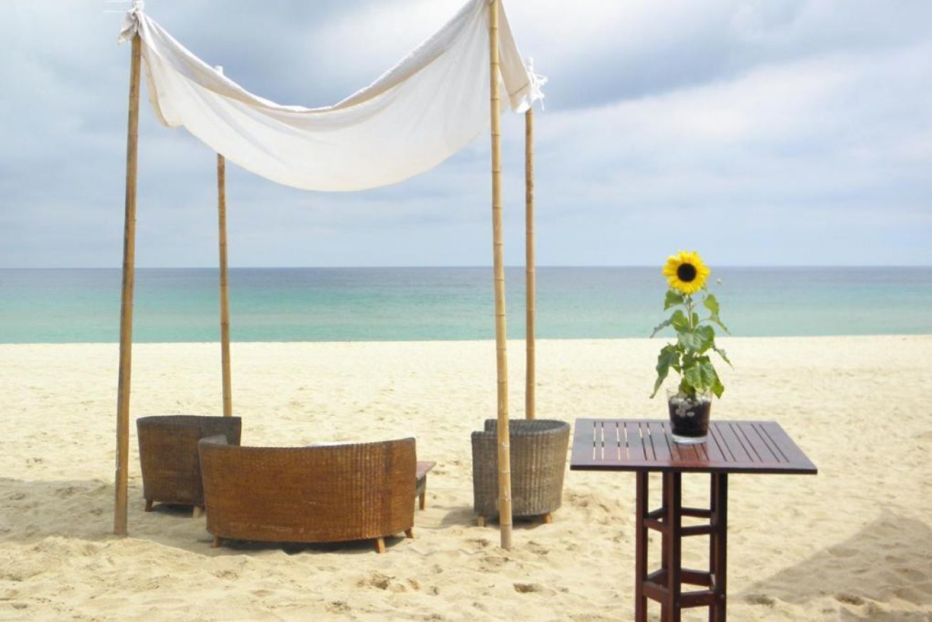 Una spiaggia nelle vicinanze, teli da spiaggia