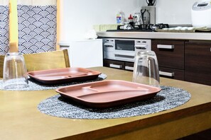 Fridge, microwave, electric kettle, cookware/dishes/utensils