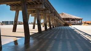 Stroll along the pier to a tranquil beachside haven.