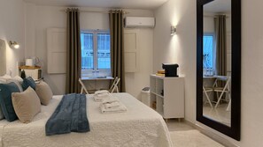 1 chambre, coffres-forts dans les chambres, fer et planche à repasser