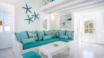 Smart TV, chimenea, reproductor de DVD, libros