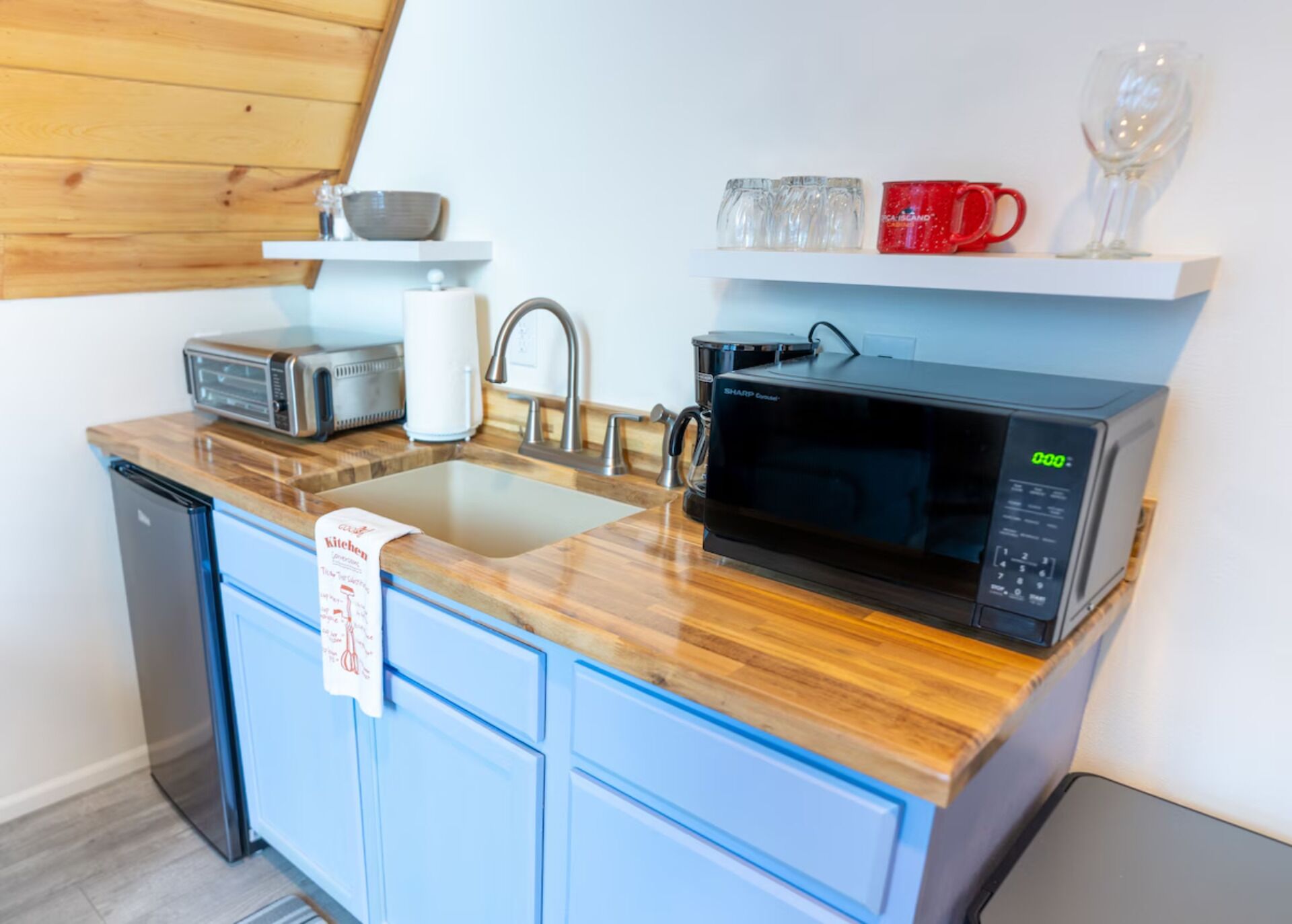 Fridge, microwave, coffee/tea maker, toaster