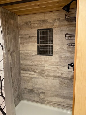 Shower, hair dryer, towels, toilet paper