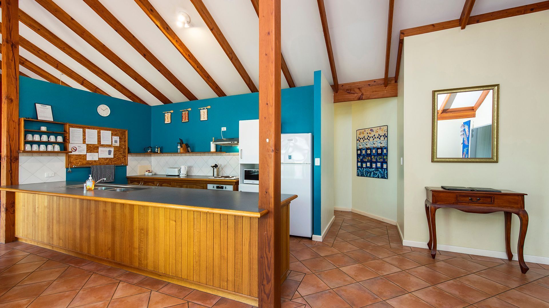 Microwave, oven, dishwasher, dining tables