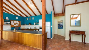 Microwave, oven, dishwasher, dining tables