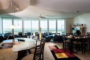 Enjoy a serene atmosphere in this elegantly designed living area with ocean views.