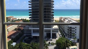 A high-rise building with a view of the beach and ocean. - Spectacular Views, Great Location on Millionaire's Row (Miami Beach)