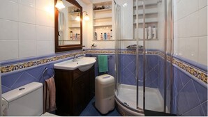 Hair dryer, towels, soap, shampoo