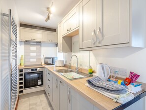 Dishwasher, high chair, cookware/dishes/utensils, freezer