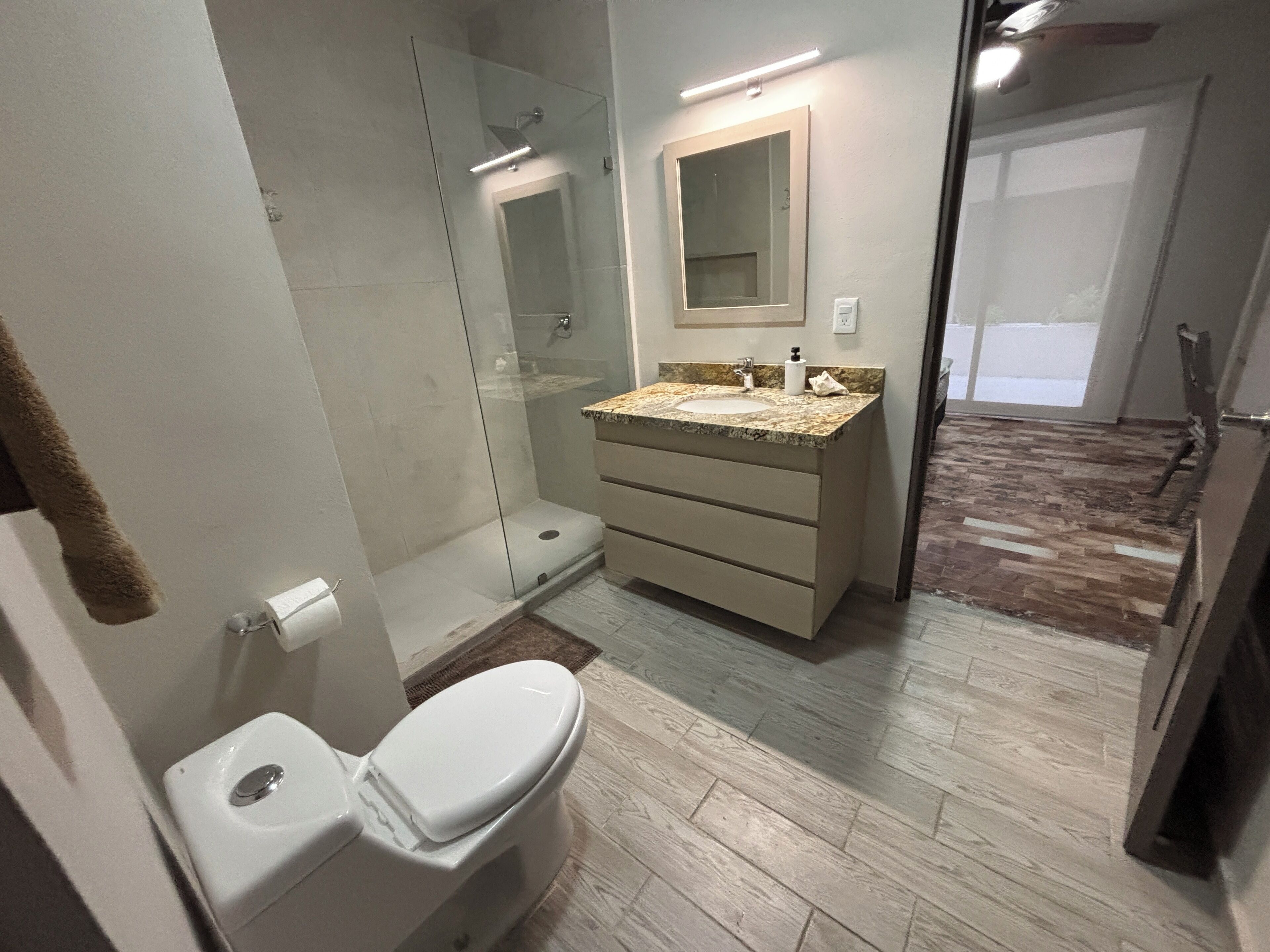 Jack & Jill Bathroom: Located downstairs and connects bedroom 2 and 3.