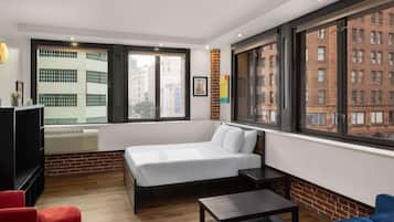 Deluxe suite, 1 slaapkamer, niet-roken (Broadway) | Een strijkplank/strijkijzer, gratis wifi, beddengoed