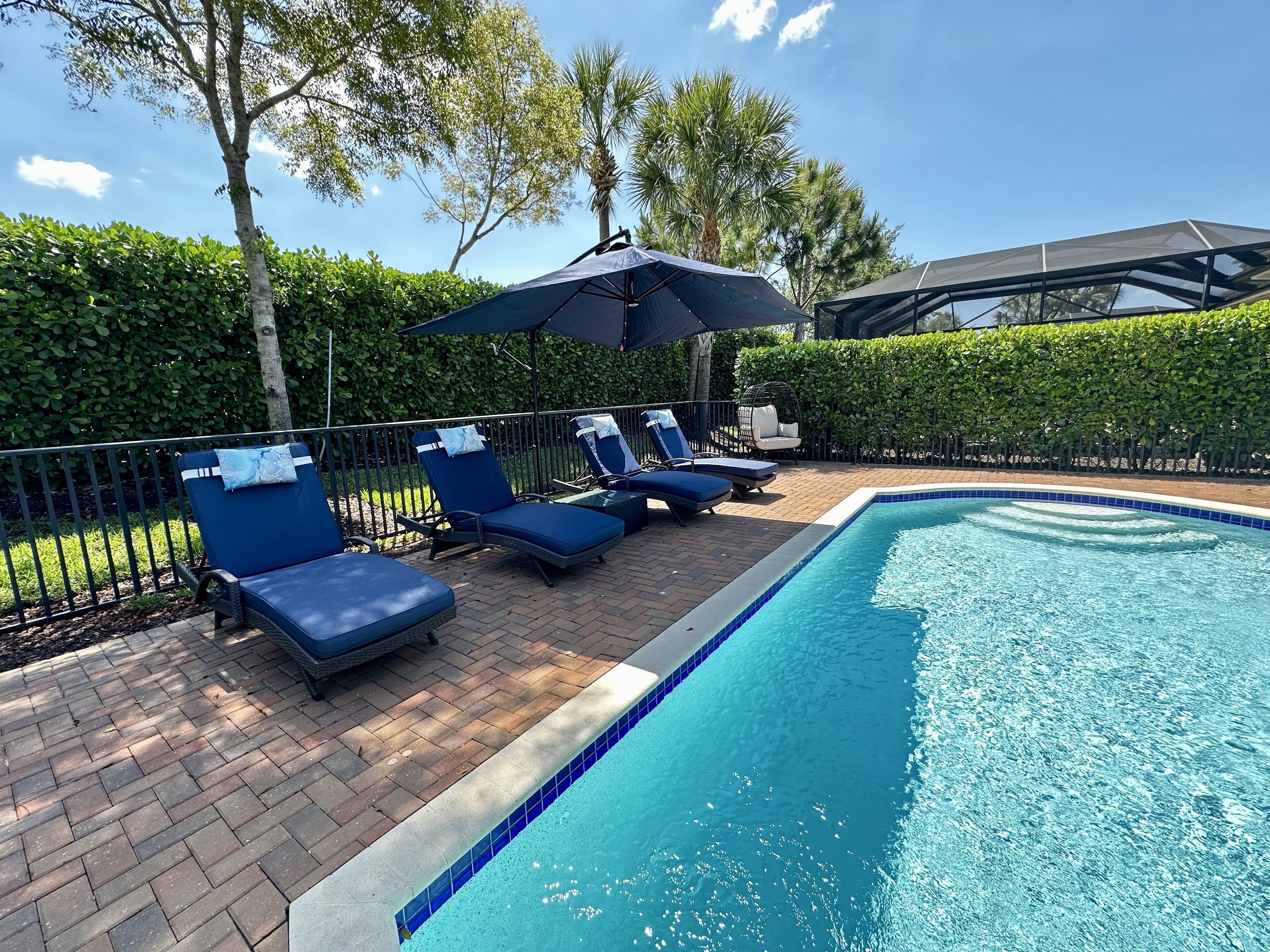 Modern home with private heated pool in a gated community!