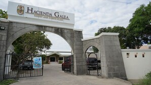 The entrance to Hacienda Galea with a stone archway and a sign indicating it is a resort and events place. - Hacienda Galea Resort and Events Place (Baliuag)