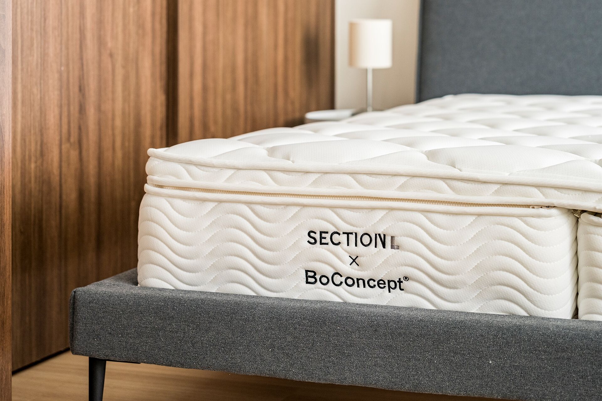 A mattress with a quilted pattern and the text "SECTION X BoConcept".