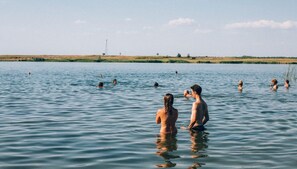 On the beach, kayaking