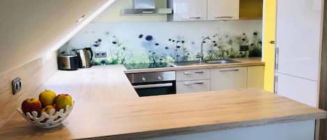 Condo | Cuisine privée | Réfrigérateur, un four, surface de cuisson, lave-vaisselle