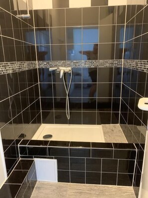 Regadera en el baño