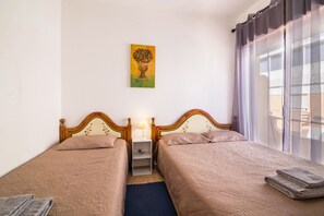 2 slaapkamers, een strijkplank/strijkijzer, gratis wifi, beddengoed
