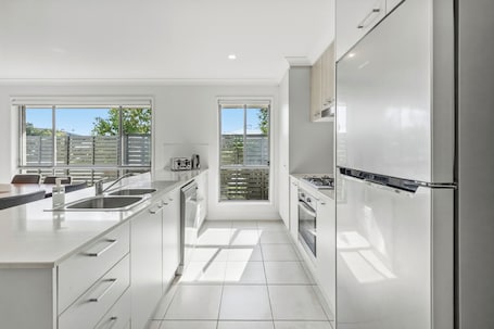 Fridge, microwave, oven, stovetop. Brand new luxury home at Dakabin close to shop and North Lakes